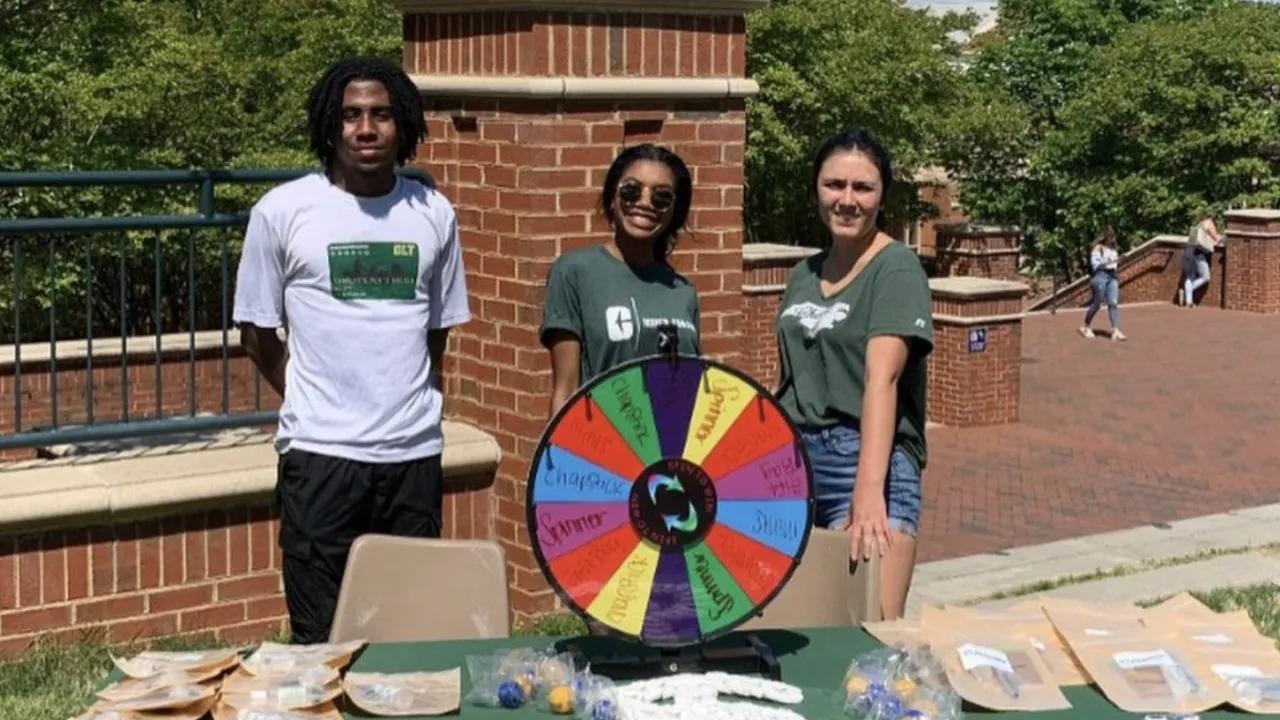 Niner Finances students at a tabling event near the Star Quad