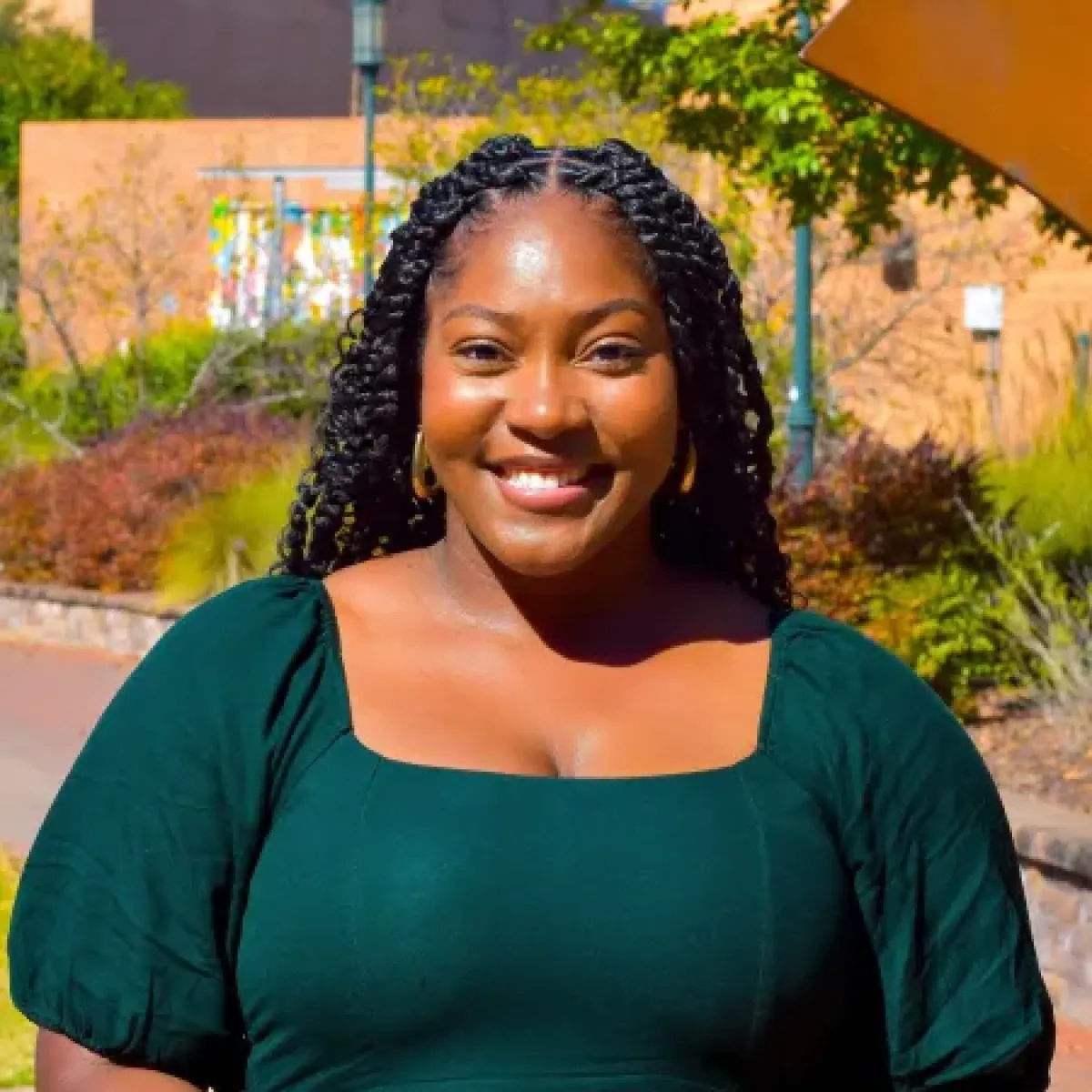 Briana Wilson smiling outside